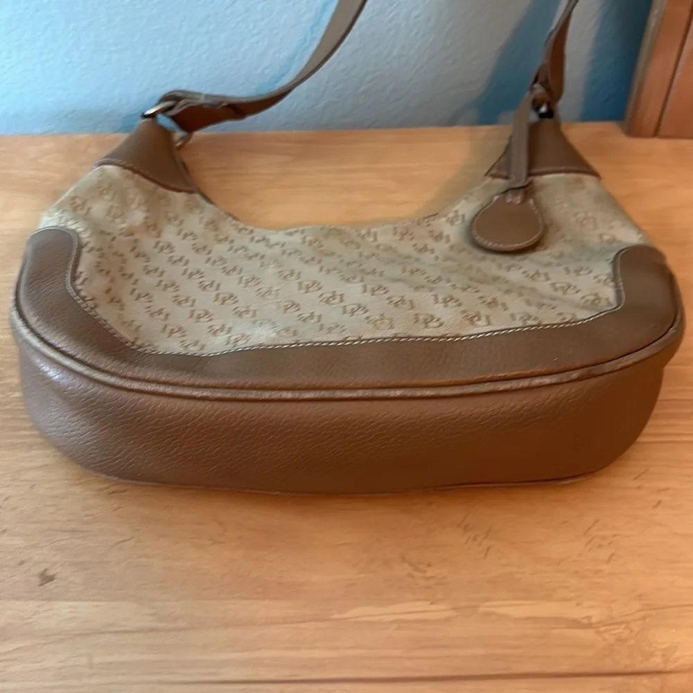 Dooney and Bourke classic monogram canvas and leather Tan color small hobo bag